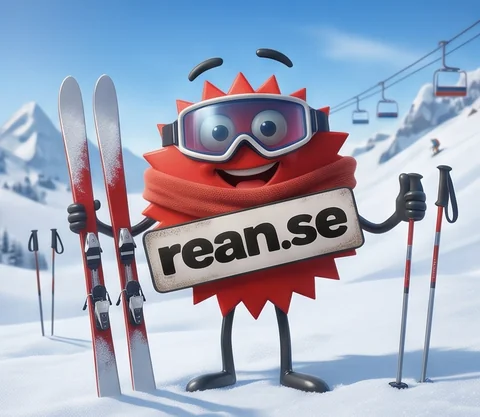 Rean-maskoten med skidglasögon, skidor och stavar i en backe